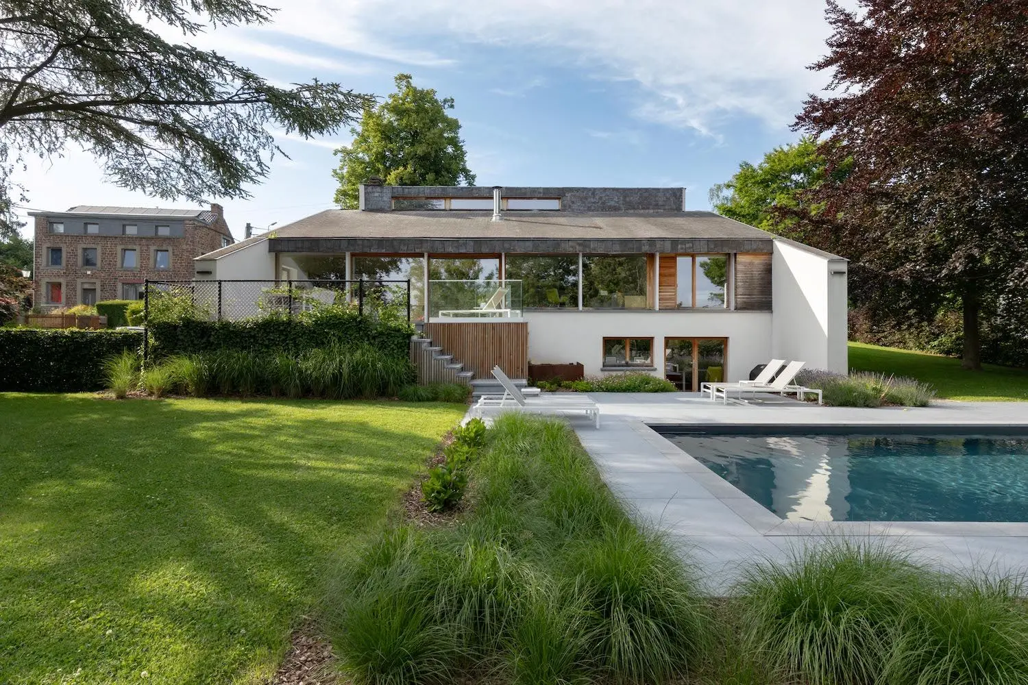 Rénovation haut de gamme maison d'architecte avec piscine extérieur